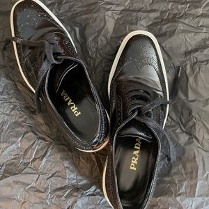 Prada flalform shoe. Size of 6 , black and white